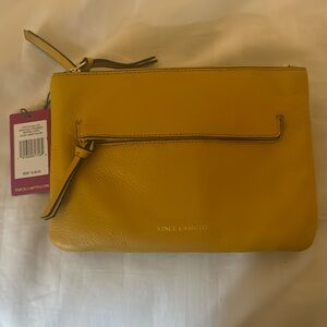 New with tags Vince Camuto bag there is slight discoloration on the back